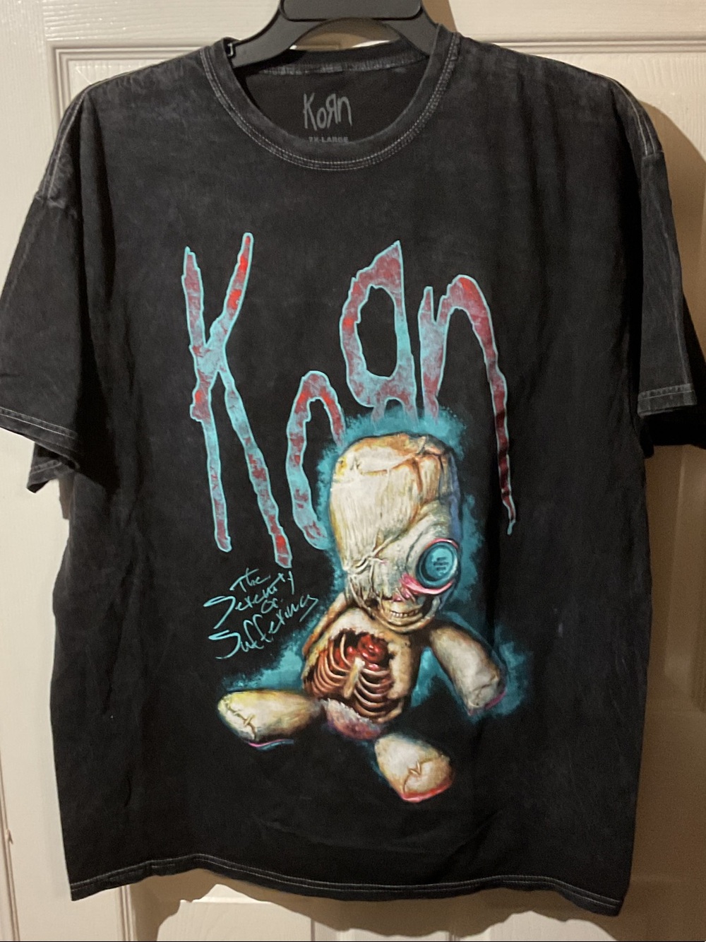 Korn “The Serenity of Suffering” Doll Graphic Tee